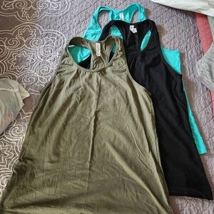 3 Bella Canvas 2xl Tank Tops in Olive, Black, and Teal